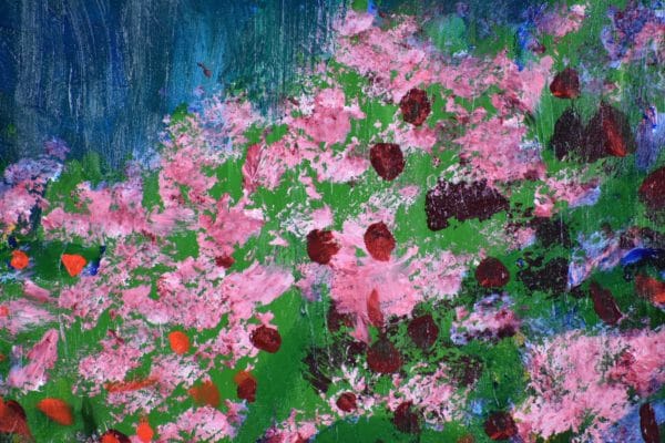 Close-up of A valley full of golden and fuchsia flowers with a background of forested mountains and blue skies. Yellow, red, pink, hunter green, blue. Large Painting by artist Donald Ryker in textured expressionist impressionist art style with unique impasto glaze technique.