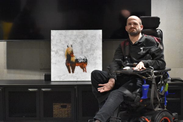 Expressionist Artist Donald Ryker beside his painting of a Horse - Standing in Snow